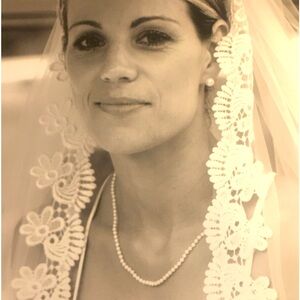 Mantilla style handmade veil, attachable with comb. Ivory color.